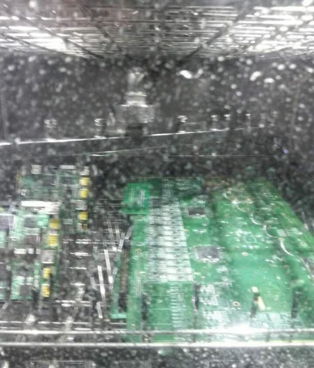 PCBA spray cleaning inside the chamber