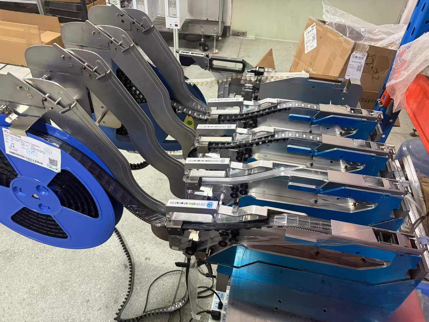 SMT tape feeder configurations for reel-packaged components