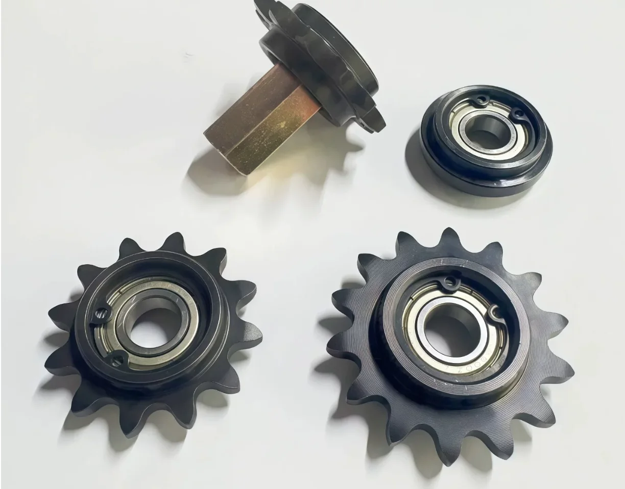 Chain sprockets and bearing-supported idler components for a reflow oven conveyor