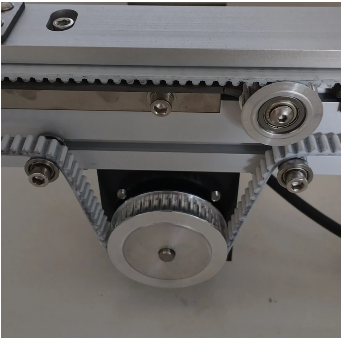 Timing belt and pulley mechanism inside industrial equipment