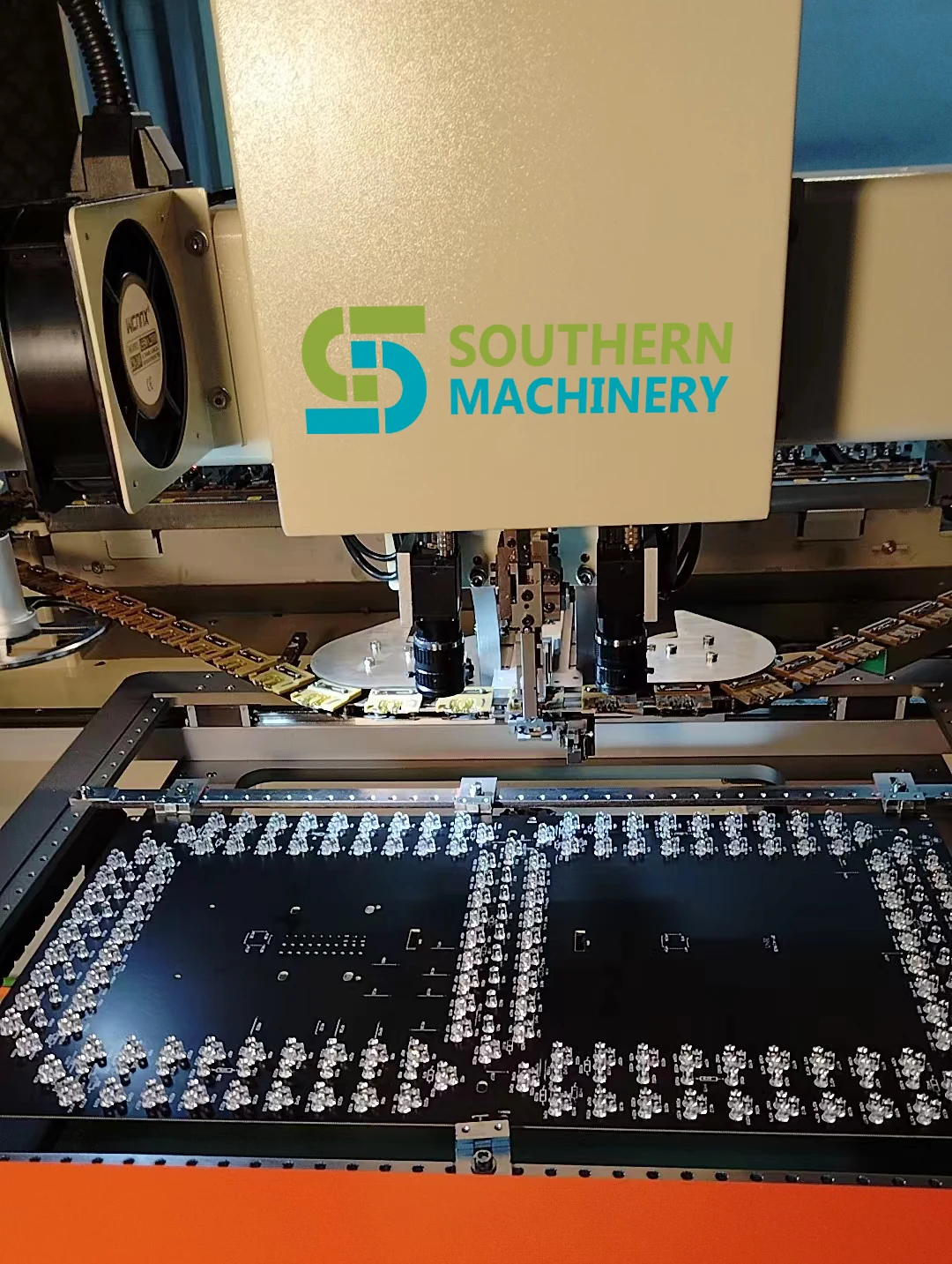 Southern Machinery insertion head operating over a THT PCB